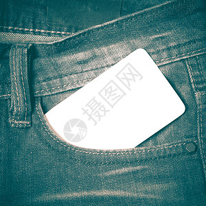 吉安口袋旧时风格的名片棉布商业纺织品牛仔裤材料卡片衣服裤子标签牛仔布背景图片