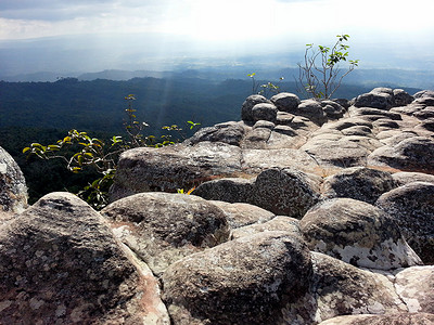 石岩山地标岩石风景太阳背景图片