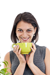 喝茶的女人巧克力杯子黑发头发植物咖啡白色女孩女士牙齿微笑高清图片素材