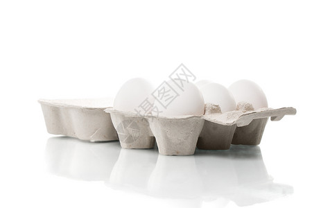 鸡蛋箱中的鸡蛋蛋盒纸板饮食圆形食物蛋黄健康饮食盒子食品蛋壳背景图片