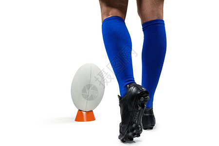 足球袜子素材橄榄球选手的低位球员即将踢球背景