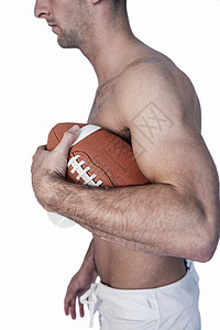 无衬衣橄榄球运动员的侧边视图背景图片
