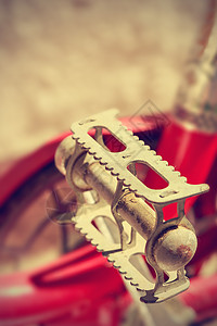 Retro自行车脚踏板 旧式的风格背景图片