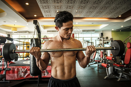提升重量胸部肌肉运动人类男性人体生活方式手臂举重力量背景图片