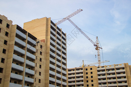 城市建筑起重机建造背景图片