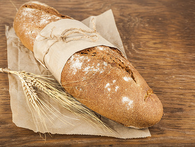 面纸包装中长面包 小麦耳朵木头高清图片素材