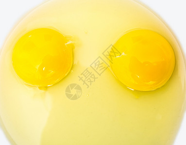 两个鸡蛋宏观美食橙子蛋黄农场烹饪早餐黄色食物液体自然高清图片素材