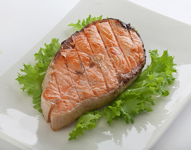 烤鲑鱼牛排烧烤白色绿色食物红色油炸炙烤海鲜鳟鱼盘子背景