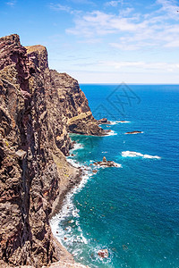 马德拉 圣洛伦科角的悬崖海岸火山旅游风景踪迹岩石蓝色海洋波峰半岛游客背景