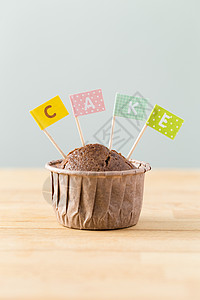 带小旗子蛋糕巧克力松饼 一个字蛋糕的小旗子背景