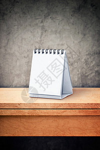 办公桌桌上的空白日历商业新年时间办公室设计螺旋日程桌面组织桌子背景图片