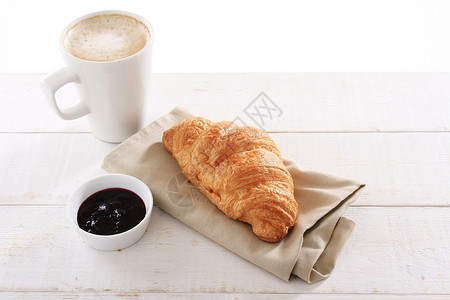 羊角面包和咖啡美食烘烤食物糕点早餐背景图片