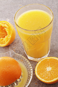 橙汁玻璃水果背景图片
