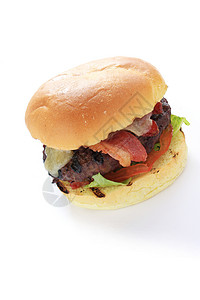 培根汉堡薯条午餐牛肉筹码沙拉白色食物美食鞋垫火腿背景图片