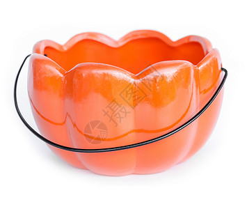 橙色陶瓷南瓜形状篮子背景图片