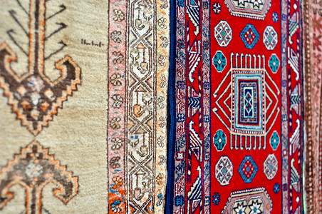 彩色羊毛手工制地毯几何学装饰品纺织品编织手工业丝绸艺术小地毯挂毯织物背景图片