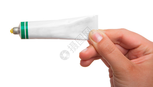 药用牙膏在白色背景上隔绝白膏状白管治愈产品宏观化妆品浴缸奶油软膏皮肤牙膏卫生背景