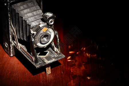 旧电影摄影机静物镜片艺术木头照片灯光工作室摄影背景图片