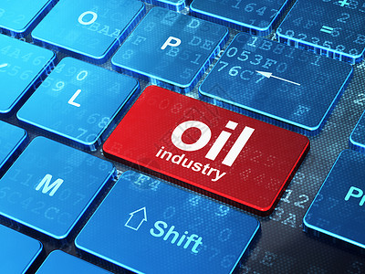 制造概念 计算机键盘背景上的石油工业背景图片