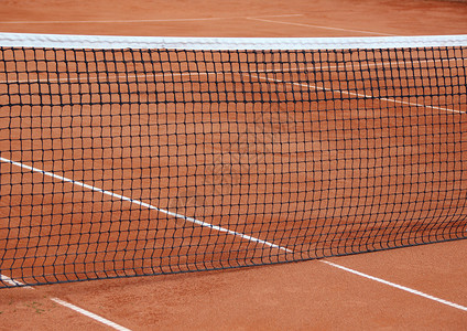 在空红色碎石法院的网球网游戏季节护柱金属黑色白色失败者运动法庭闲暇背景图片