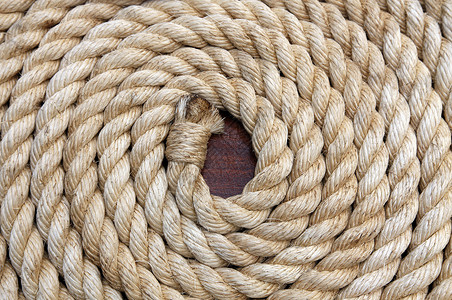 绳管圈圈静物航海海员技术生活房间圆形古铜色线圈背景图片