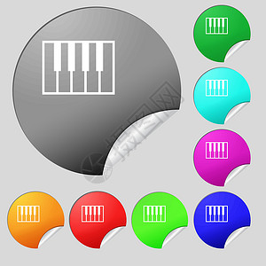 钢琴键图标标志 一套八个多色圆形按钮贴纸 韦克托背景图片