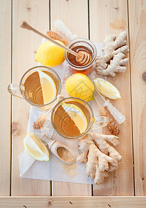 果味茶新酿的姜茶疗法热饮茶杯食谱维生素水果杯子柠檬糖糖蜂蜜背景