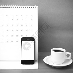 咖啡杯 电话和日历写作铅笔工作商业办公室职场白色笔记杯子笔记本背景图片