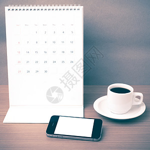 咖啡杯 电话和日历咖啡办公室笔记商业工作铅笔桌子职场笔记本白色背景图片