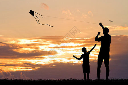 日落时 父亲和儿子带着风筝孩子天空玩具闲暇男生快乐男人插图家庭幸福背景图片