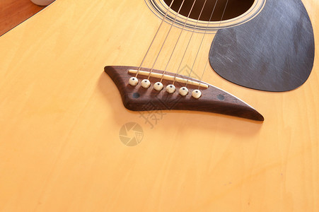 架桥音响吉他金属音板木板警卫木头和弦音乐家乐器焦点细绳吉他手高清图片素材