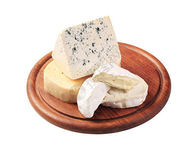 各种奶酪美食圆形奶制品羊乳食物砧板背景图片