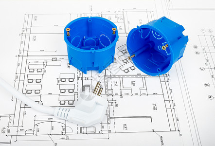 建筑计划和蓝图卷蓝色绘画插头数字工业建筑学房子测量金属塑料背景图片