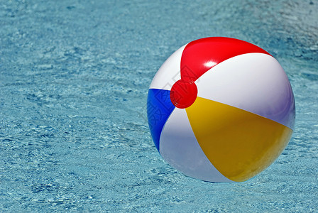 卡通沙滩游泳池游泳池中充满多彩的海滩球背景