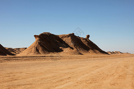 力量沙漠Ong Jemal突尼斯孤独力量旅行旅游寂寞爬坡干旱波纹海浪空腔背景