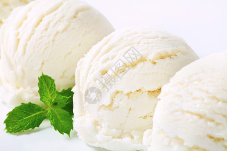 白冰淇淋饼干椰子酸奶味道白色食物冰淇淋库存勺子奶制品柠檬背景图片