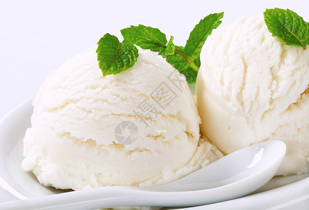 白冰淇淋饼干果子冰冻奶油状勺子柠檬白色库存椰子甜点盘子背景图片