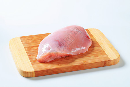 新鲜火鸡奶片砧板食物胸肉鱼片高清图片