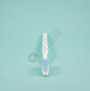 干净的白牙刷口服牙科化妆品牙医保健刷子塑料白色浴室卫生背景图片