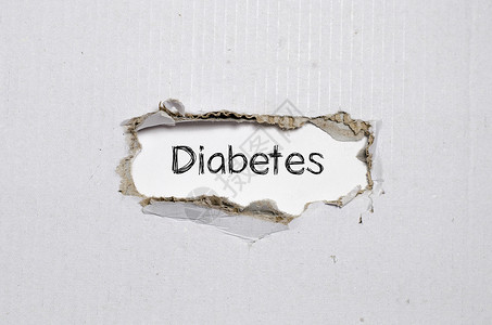 糖尿病这个词出现在撕破的纸后面预防营养药品风险诊断肥胖饮食医疗保险症状葡萄糖高血糖症高清图片素材