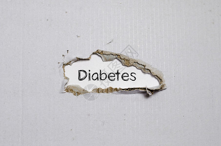 糖尿病这个词出现在撕破的纸后面预防肥胖饮食药品医疗保险风险葡萄糖症状重量营养警告高清图片素材