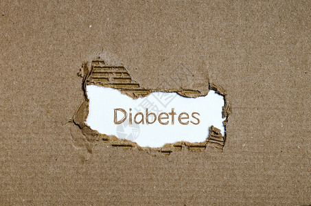 糖尿病这个词出现在撕破的纸后面医疗保险治疗葡萄糖胰腺症状营养药品重量预防饮食紊乱高清图片素材