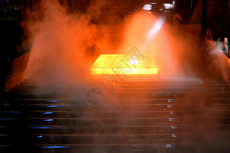 轧机钢厂素材输送器上热钢生产线制造业金属输送带冶金橙子商业设备机器建筑背景