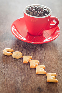配香囊字体配红咖啡杯的咖啡字母饼干糕点食物棕色英语红色咖啡黄色字体营养甜点背景