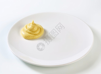 芥辣酱漩涡调味品美味白色敷料盘子食物背景图片