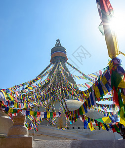 加德满都的信仰眼睛经幡天空地标世界旗帜宗教旅游神社背景图片