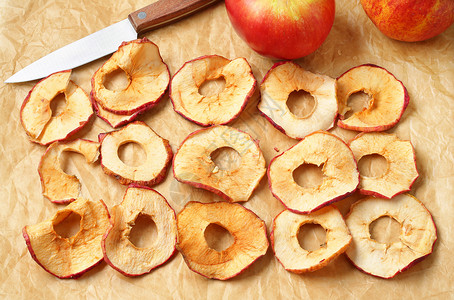 苹果薯片棕色食物小吃烘焙羊皮纸水果苹果片用纸面包纸背景图片