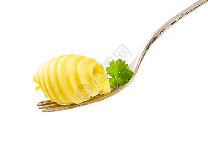叉子上的黄油卷曲盘香菜刀具食物传播黄油金属食品奶制品背景图片