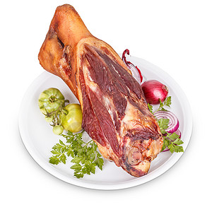 烟熏猪叉盘子猪蹄洋葱白色猪肉关节食物背景图片