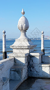 葡萄牙里斯本日落旅游中心阳光建筑天空天气旅行海浪柱状体背景图片